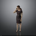 Woman in Brown Dress Talking on Phone Against Gray Background Wearing Black Heels and Ponytail