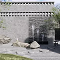Serene Courtyard Garden Featuring Gray Wall Waterfall Large Rocks Trees And Stone Paths