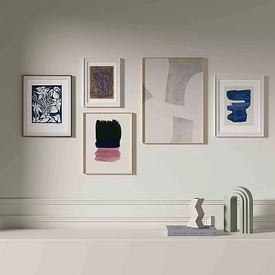 Multiple Abstract Paintings on Light Wall with Various Frames and Decorative Elements 3d model