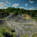 Natural Scenic Landscape With Forest Valley Rocky Terrain And Blue Sky Clouds