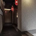 Traditional Chinese Interior Design With Long Wooden Table Lanterns And Wall Painting