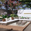 Courtyard Garden Design With Wooden Deck White Sofa Brown Pillows Stone Table And Green Plants