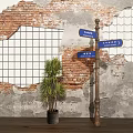 Garden Landscape With Brick Wall Grid Pattern Street Sign Arrows And Potted Plant