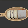 Homemade Bread on Wooden Tray Featuring Unsliced Loaf and Sliced Pieces with Orange White Coating