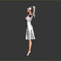A Woman Standing In White Polka Dot Dress With Arms Outstretched Against Gray Background