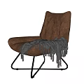 Brown Leather Tufted Leisure Chair With Gray Fringed Blanket Black Metal Legs Modern Design