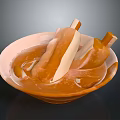 White Household Bowl With Orange Popsicles And Liquid On Dark Background