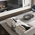 Modern White Sofa and Round Coffee Table Set with Throw Pillows in Spacious Living Area