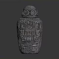Silver Carved Vessel With Goggle Like Top Design And Intricate Engraved Patterns