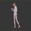 Professional Woman In White Shirt And Beige Pants Holding A Cup Standing Against Gray Background