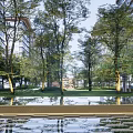 Elegant Modern Commercial Street with High Rise Buildings Glass Pavilion Trees Pond and Leisure Area