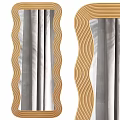 Golden Wavy Framed Mirror Against Gray Curtains With Soft Light Shadows