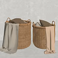 Two Woven Storage Baskets with Brown Beige Pillows and Hanging Blankets Against Gray Wall