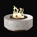 Modern Minimalist Round Stone Fireplace With Burning Flames And Black Pebbles