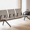 Modern Public Bench Featuring Light Gray Seats Black Metal Frame Armrests And Side Table