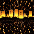 Numerous Sky Lanterns Flying in Night Sky With Chinese Characters And Wishes