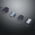 Set Of Different Colored Modern Trolleys Arranged On Dark Background