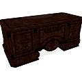 Vintage Dark Wooden Desk With Intricate Carved Details And Drawers