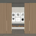 Open Wooden Sliding Doors Revealing Fireplace And Decorative Artworks In Interior