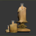 Metallic Decorative Candle Holder With Two Lit Beige Candles And Burning Flames