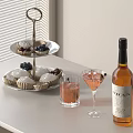 Wine Bottle And Wine Glasses With Dessert Stand Cupcakes Fresh Fruits On Window Table
