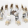 Art Supplies Setup With Wooden Easels Sketchpads Stools And Plaster Statue