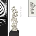White Intricate Carved Sculpture With Hollow Patterns And Indoor Light Shadow