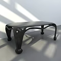 Modern Black Dining Table With Curved Legs In Light Shadow Interior