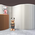 Curved Room Divider With White And Brown Panels And Decorative Figurines
