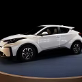 White Modern Car With Sleek Exterior Design And Alloy Wheels On Display Platform
