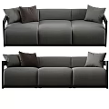 Modern Gray Three-Seater Fabric Sofa With Brown Pillows For Living Room