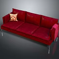 Red Three Seater Sofa With Decorative Pillow And Red Blanket On Metal Legs