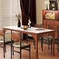 Cozy Restaurant Dining Area With Wooden Table Upholstered Chairs And Fruit Bowl