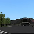 Modern Commercial Complex With Glass Facade Green Surroundings And Parking Area