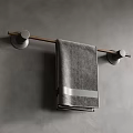 Wall Mounted Gray Towel Rack With Soft Gray Towel And White Stripe