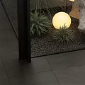 Indoor Landscape Design With Glass Walls Various Green Plants Round Lights Stones And Ground Cover