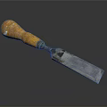 Classic Wood Chisel With Wooden Handle And Metal Blade On Dark Background