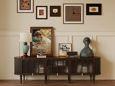 Dark Wood TV Stand With Wicker Doors And Decorative Lamp Framed Pictures On Light Wall 3d model
