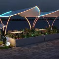 Elegant Modern Outdoor Pergola With Night Lighting Seating Plants And Water View
