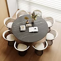 Modern Round Marble Dining Table Set With Padded Woven Chairs For Cozy Home Dining Space