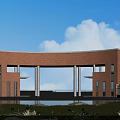 Red Brick Entrance Gate With Curved Design Water Pool And Green Plants Under Blue Sky