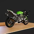 Kawasaki Green And Black Sport Motorcycle With Streamlined Body And Alloy Wheels
