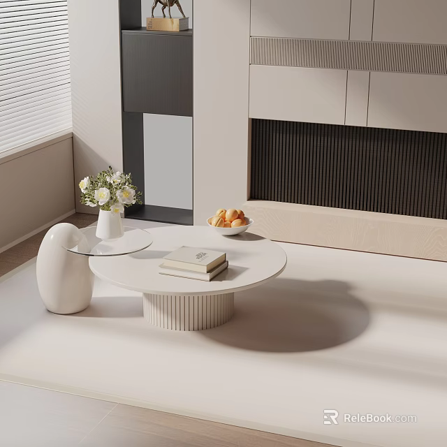 Modern Beige Sofa and Round Coffee Table with White Flower Vase Books and Fruit Bowl 3d model 