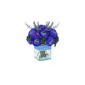Purple Ranunculus Flowers in Glass Vase with Blue Polka Dot Ribbon and Green Leaves