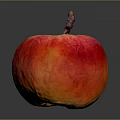 Shiny Juicy Red and Orange Apple with Stem on Dark Background