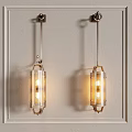 Two Illuminated Wall Lamps with Metal Frame and Clear Glass Shade Mounted on Wall