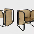 Modern Rattan Leisure Chair With Black Metal Frame And Comfortable Seating Design