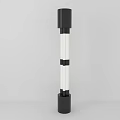 Modern Floor Lamp with Black and White Cylindrical Structure and Vertical Light Tube