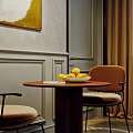 Elegant Modern Kitchen Interior With Dark Green Cabinets Marble Island And Dining Chairs