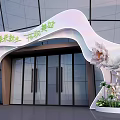 Spring Rebirth Themed Event Entrance With Curved Design Glass Doors And Flower Decorations